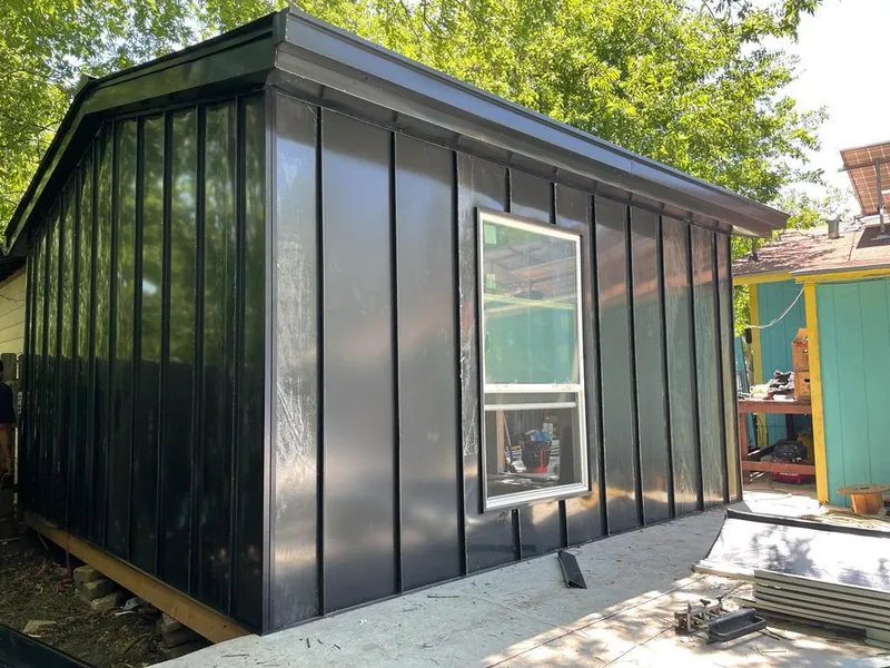 Black standing seam metal wall panels for Roof Inspection in Bonney Lake